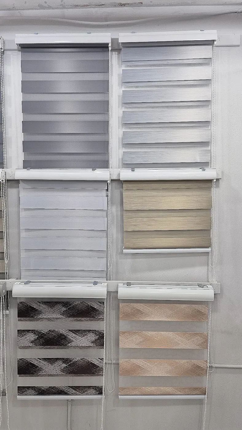 Blind samples in grey, cream and charcoal on display in the shop
